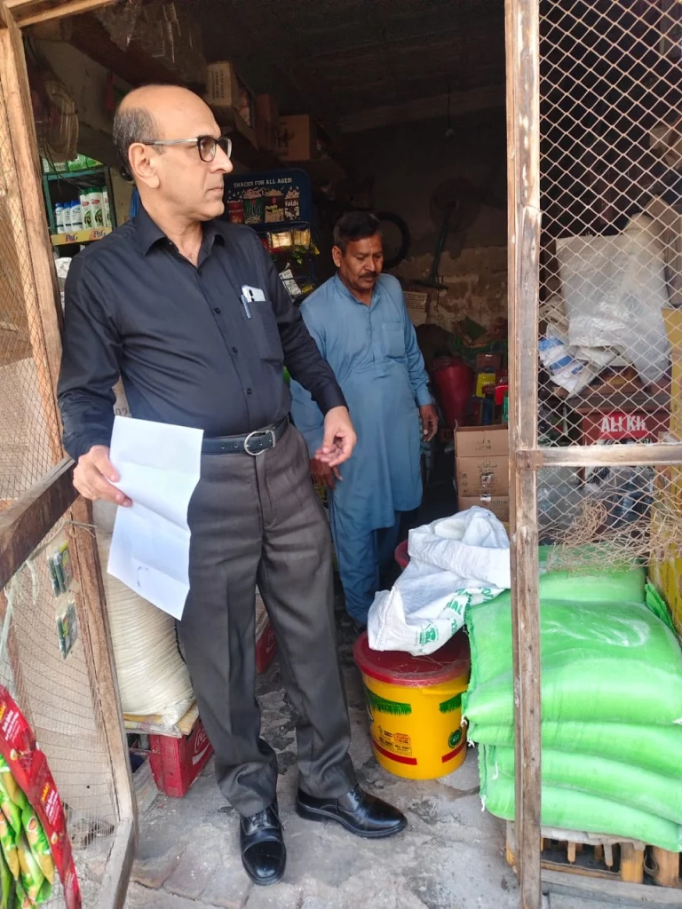 Price Control Magistrate inspecting shops during anti-profiteering crackdown in Toba Tek Singh.