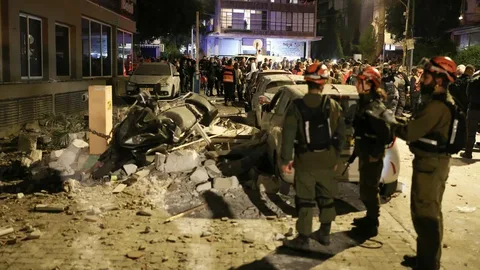 Iran war day 18 US-Israel attacks latest update casualties March 2026