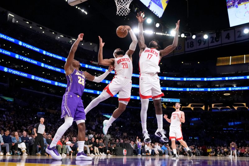 Houston Rockets players celebrate after defeating the Los Angeles Lakers 99-93 in Game 5 of the 2026 NBA Playoffs first-round series