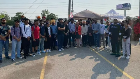 Indian students at a Canadian university campus looking worried amid new immigration rules in 2025