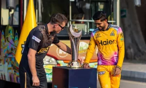 Babar Azam lifting PSL 2026 trophy with Peshawar Zalmi team at Gaddafi Stadium Lahore