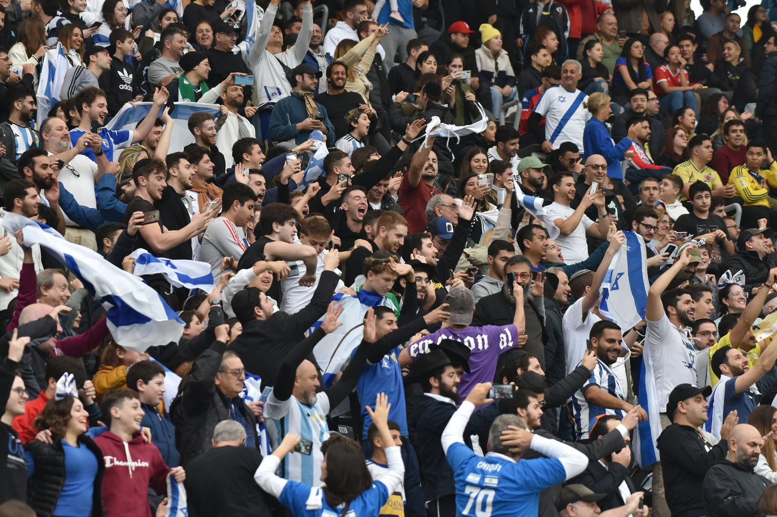 Football fans protesting during Ireland and Qatar match over Israel football dispute and boycott debate