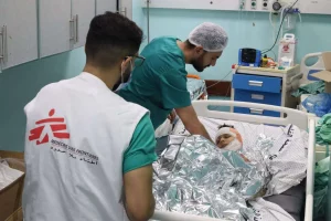 MSF Gaza staff distributing aid to malnourished Palestinian mothers and infants amid ongoing conflict