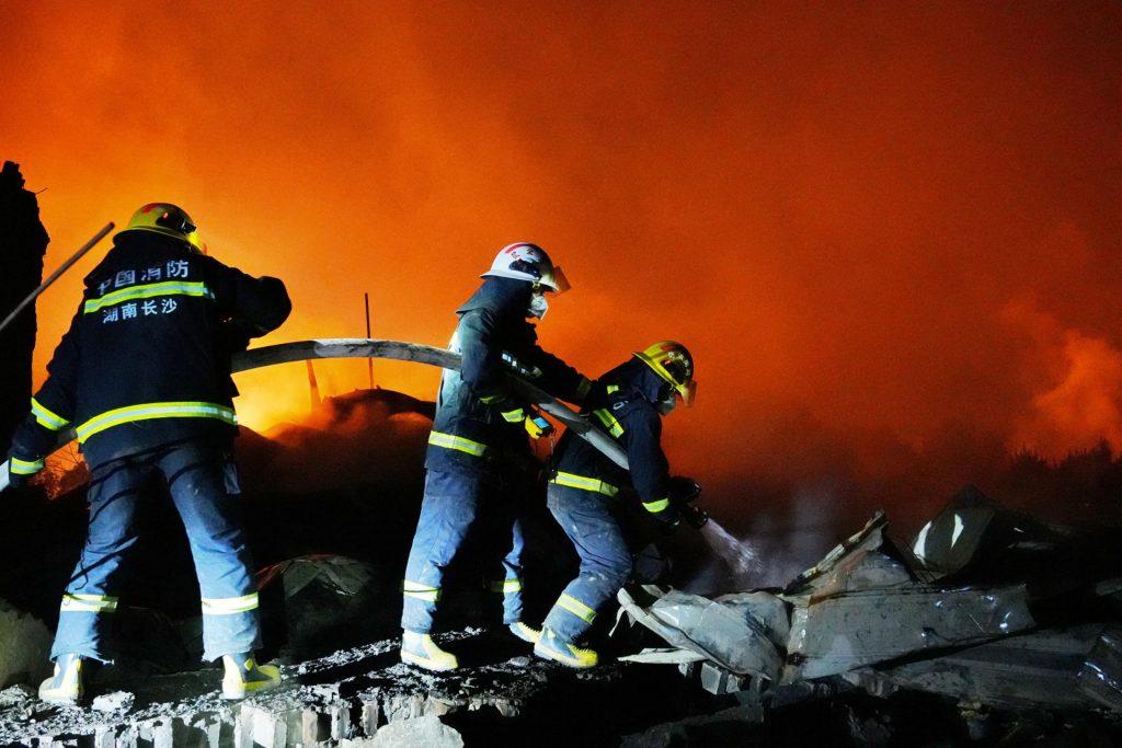 Fire rescue forces conducting operations after a massive fireworks factory explosion at Huasheng Fireworks plant in Liuyang, Hunan Province, China, May 2026.
