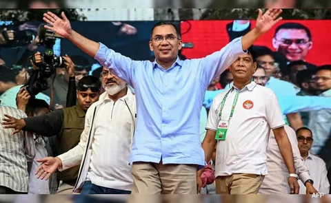 Bangladesh Nationalist Party BNP supporters celebrating election victory in Dhaka streets as Tarique Rahman claims two-thirds parliamentary majority, February 2026