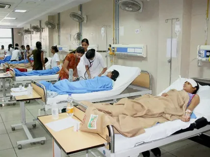 Medical staff reviewing HIV screening blood test results before surgery in a Pakistani hospital operating theatre, 2026