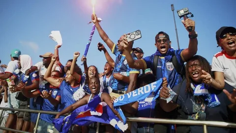 Cape Verde Blue Sharks players celebrating World Cup 2026 qualification after 3-0 victory over Eswatini in Praia, October 2026