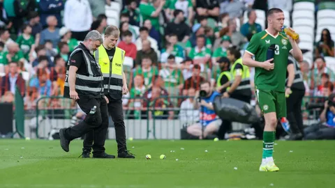 Football fans protesting during Ireland and Qatar match over Israel football dispute and boycott debate