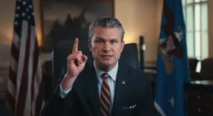 Pete Hegseth speaking during a public event, highlighting his military background, Fox News career, and role in US defense policy discussions.