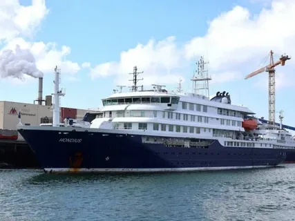 Cruise ship MV Hondius anchored off the port of Praia, Cape Verde, amid a suspected hantavirus outbreak that has killed three passengers May 2026.
