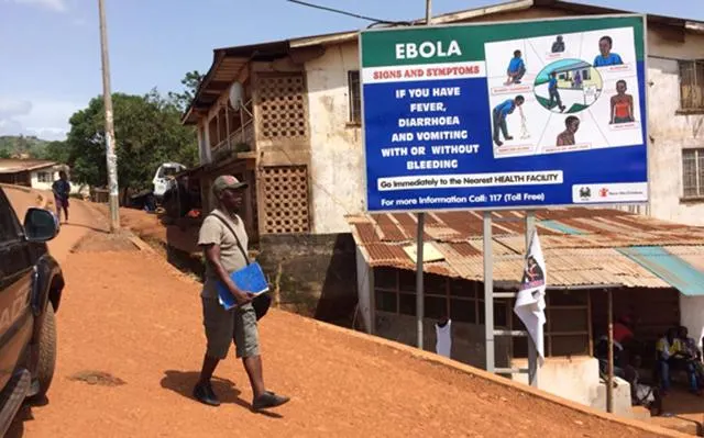 Healthcare workers in protective suits responding to an Ebola outbreak as global health authorities monitor the spread of the virus in 2026.
