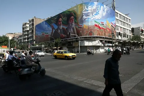 Diplomatic meeting between US and Iranian officials discussing ceasefire agreement terms and peace negotiations in 2026.