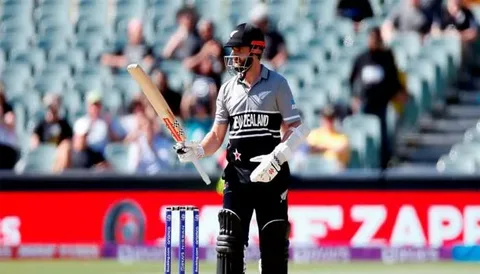 Kane Williamson playing for New Zealand during an international cricket match while fans discuss his retirement plans and future career.