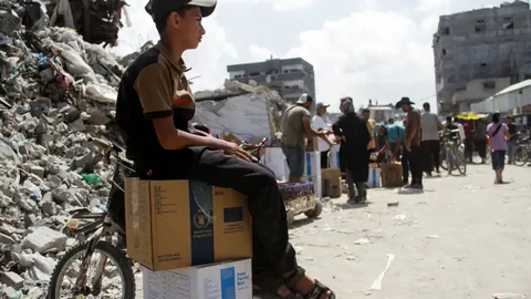 Doctors treating patients amid Gaza humanitarian crisis as medical shortages impact hospitals and healthcare services