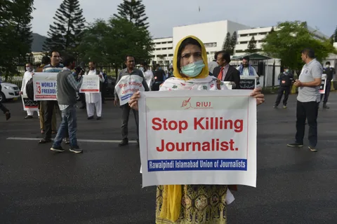 A journalist’s press equipment lying on the ground in Balochistan after a reported attack, symbolizing risks faced by media workers in Pakistan.