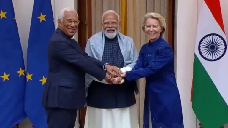 EU and India representatives shaking hands during a high-level trade agreement meeting, symbolizing the “mother of all deals” in global diplomacy.