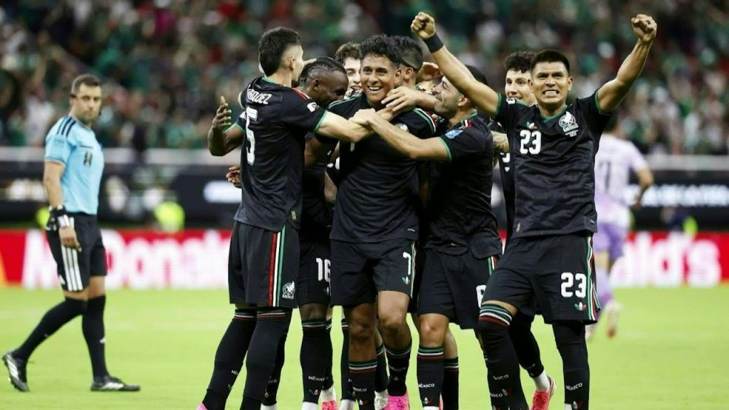 Mexico and South Korea players in action during a FIFA World Cup 2026 match with fans filling the stadium stands.