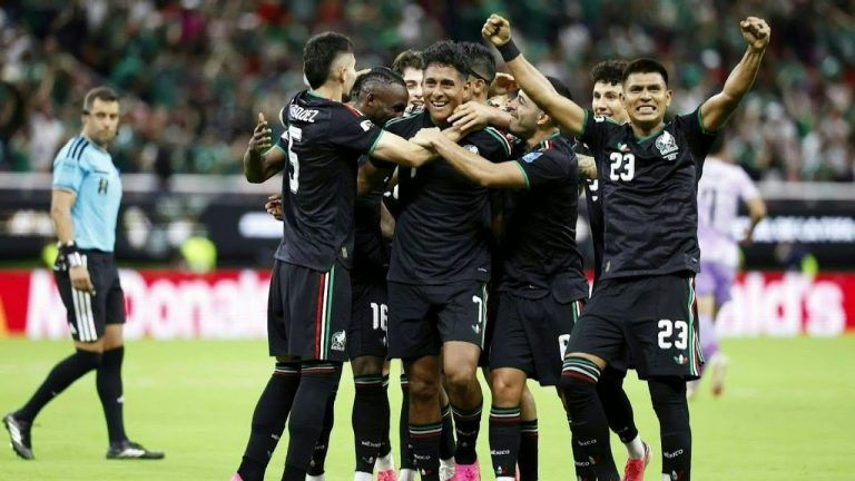 Mexico and South Korea players in action during a FIFA World Cup 2026 match with fans filling the stadium stands.