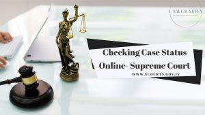 Lawyer using laptop to check Supreme Court of Pakistan online case status and legal judgements through digital case search system.