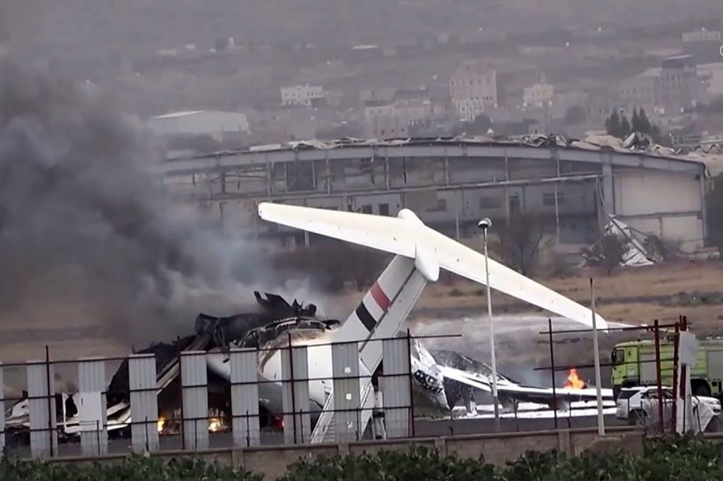 Smoke rising over Sanaa international airport in Yemen after air strikes, July 2026