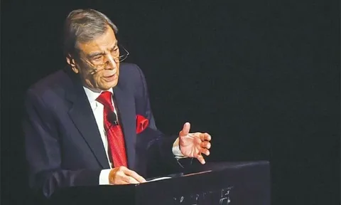 Zia Mohyeddin Documentary poster showing the actor reciting Urdu poetry on stage