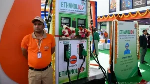 Rows of cars at an Indian automotive industry showroom amid E20 ethanol fuel policy debate