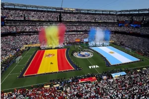 FIFA World Cup 2026 closing ceremony stage with Trump, Infantino, and Spain players celebrating with the trophy under stadium lights