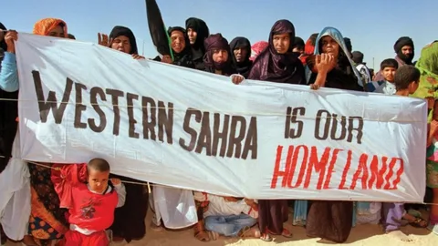 Road sign on the Tiznit-Dakhla highway in Western Sahara, highlighting renewed attention to Morocco's disputed territory.