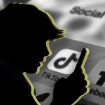 Child using a smartphone, illustrating the social media age limit debate for children in Pakistan