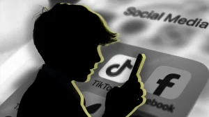 Child using a smartphone, illustrating the social media age limit debate for children in Pakistan