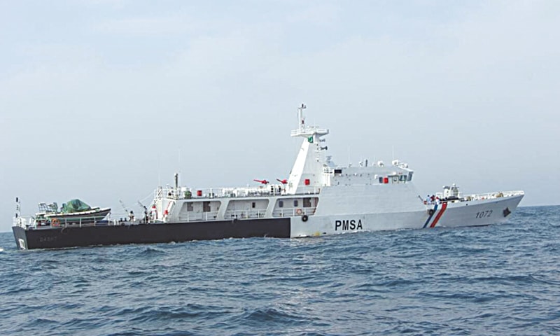 Pakistan Maritime Security Agency PMSA officers in blue camouflage uniform standing at PMSA Headquarters Karachi Dockyard Road