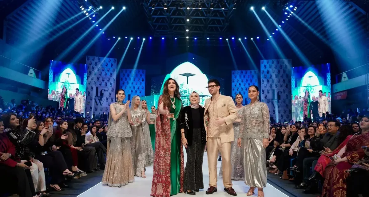Models walk the runway at LAAM Fashion Week 2026 in Lahore during a designer showcase