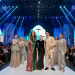 Models walk the runway at LAAM Fashion Week 2026 in Lahore during a designer showcase