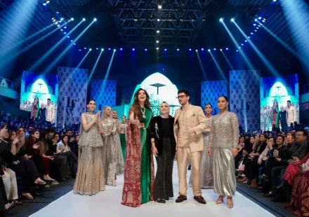 Models walk the runway at LAAM Fashion Week 2026 in Lahore during a designer showcase