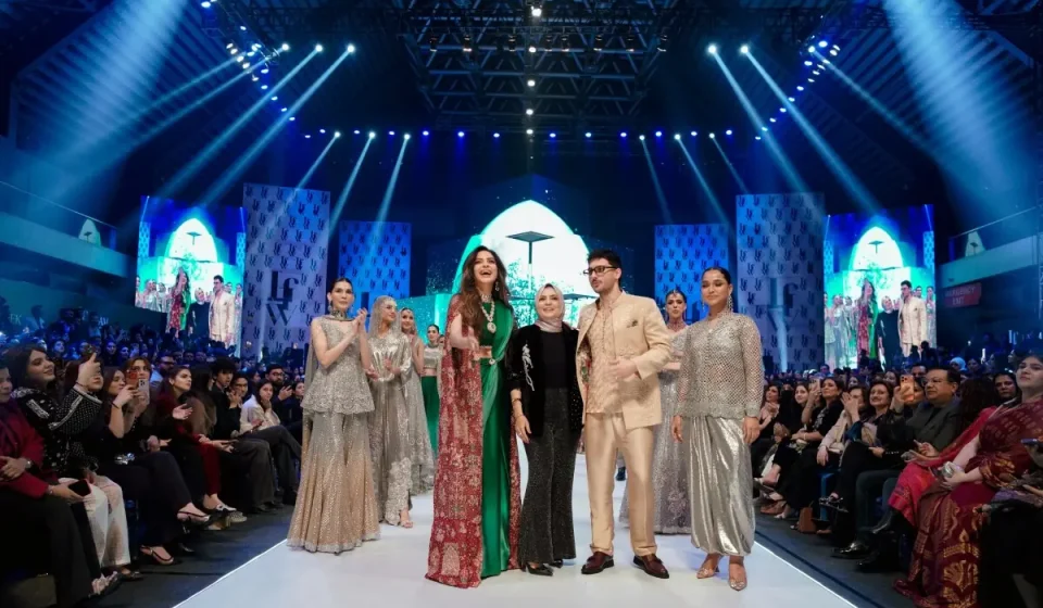 Models walk the runway at LAAM Fashion Week 2026 in Lahore during a designer showcase
