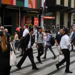 Australia student visa documents and passport on a desk symbolizing new immigration crackdown