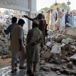 Security forces standing guard near the Kohat Police Lines mosque after the terrorist attack