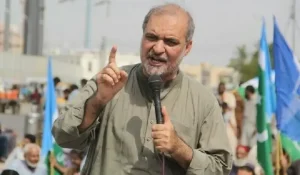 JI workers gathered at a sit-in demonstration ahead of the party's march towards Islamabad