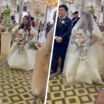 Bride wading through floodwater at a Philippines flood wedding inside a Bulacan church