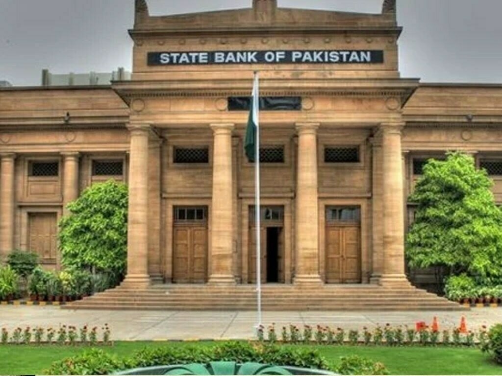 State Bank of Pakistan building in Karachi with a rising inflation graph overlay