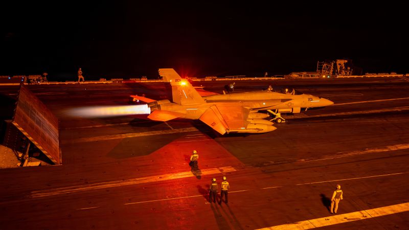 US Navy warship launching a munition during strikes on Iran