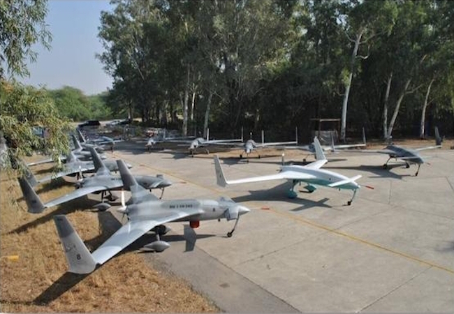 Pakistan Army officers reviewing drone technology during defense procurement talks with a US company delegation