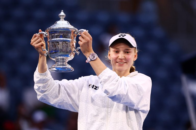 Elena Rybakina holds the US Open trophy after her win over Aryna Sabalenka in the 2026 final