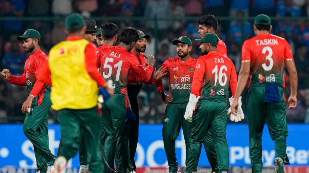 Bangladesh national cricket team players standing together on the field during a T20 match