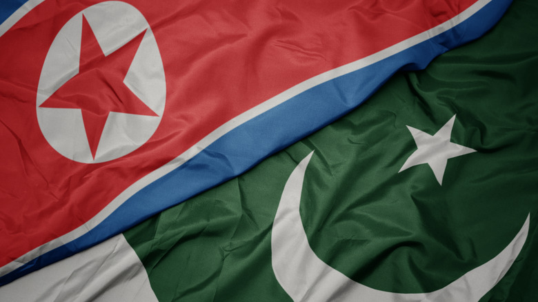 Map outline of Pakistan and North Korea with diplomatic handshake icon representing Islamabad diplomatic relations with Pyongyang