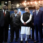 BRICS leaders seated together at the New Delhi summit discussing Middle East tensions and regional peace and stability
