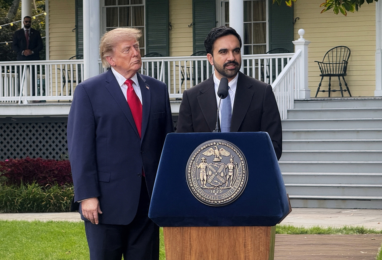 Zohran Mamdani welcoming Donald Trump outside Gracie Mansion in New York
