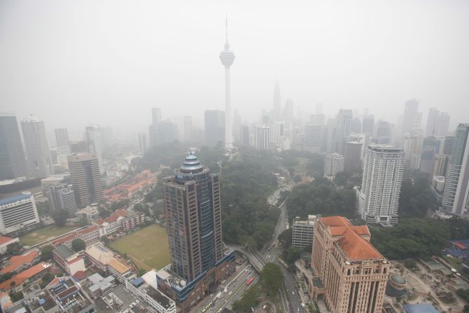 Kuala Lumpur skyline covered in thick Malaysia haze as schools close due to smoke from Indonesian fires