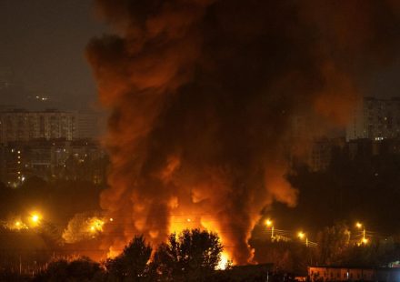 Rescuers search a damaged apartment building in Pryluky after Russia attacks Ukraine with drones and missiles