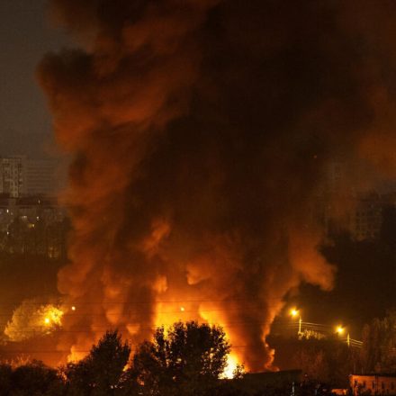 Rescuers search a damaged apartment building in Pryluky after Russia attacks Ukraine with drones and missiles